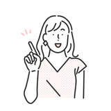 笑顔で人差し指を立てている女性